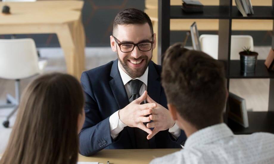 <img src="meeting.jpg" alt="man talking to a couple" /> 